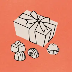 Un cadeau emballé et des chocolats, une scène un peu cucul la praline pour un moment gourmand.