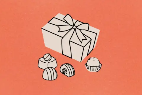 Un cadeau emballé et des chocolats, une scène un peu cucul la praline pour un moment gourmand.