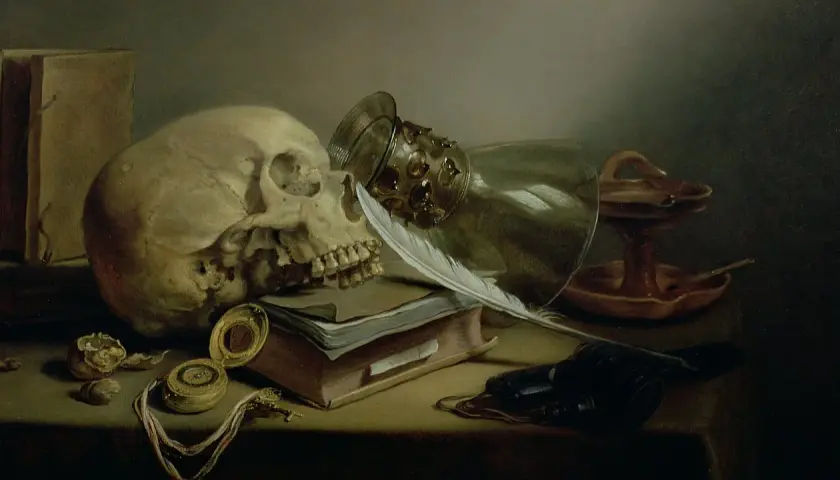 Vanitas tableau : crâne, livre, plume, verre renversé, montre à gousset, bougie éteinte. La vie est éphémère.