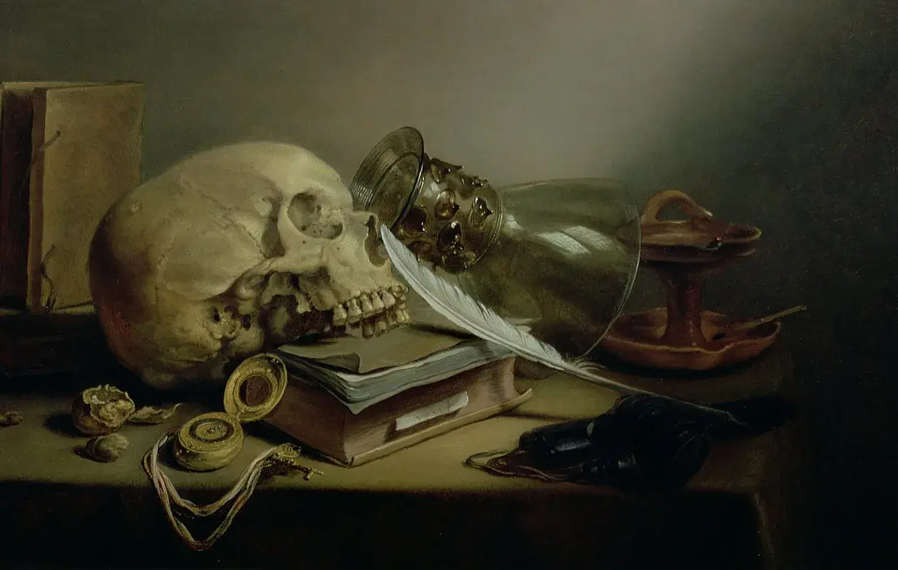 Vanitas tableau : crâne, livre, plume, verre renversé, montre à gousset, bougie éteinte. La vie est éphémère.