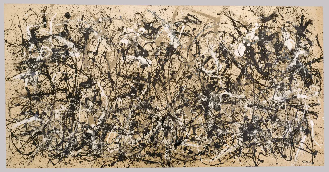 Peinture abstraite avec des éclaboussures de peinture noire, blanche et beige. La **répétition art** des lignes crée un motif complexe et dynamique.
