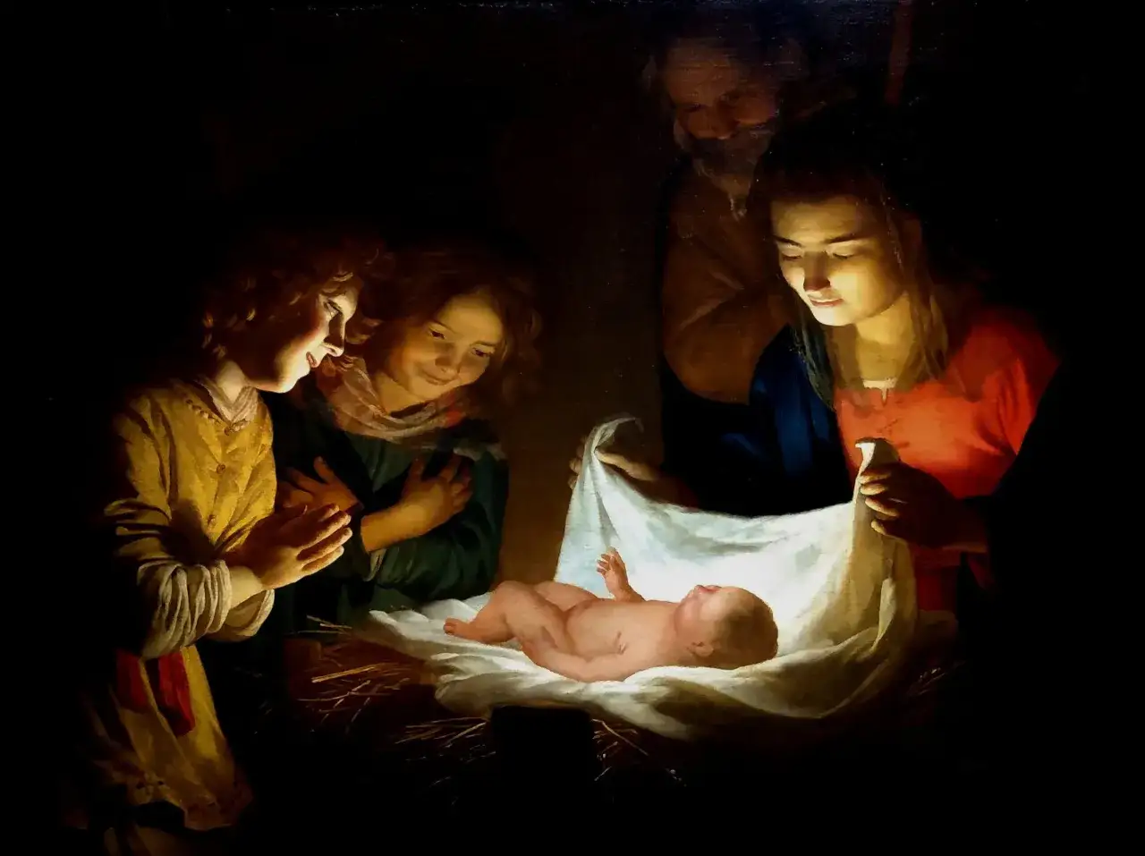 Une peinture en clair-obscur de la Nativit&eacute;. La Vierge Marie, Joseph et deux enfants regardent avec &eacute;merveillement le b&eacute;b&eacute; J&eacute;sus dans sa cr&egrave;che.
